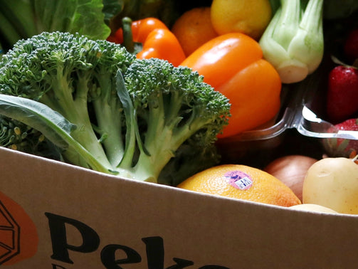 close-up of peculiar and surplus produce in peko box